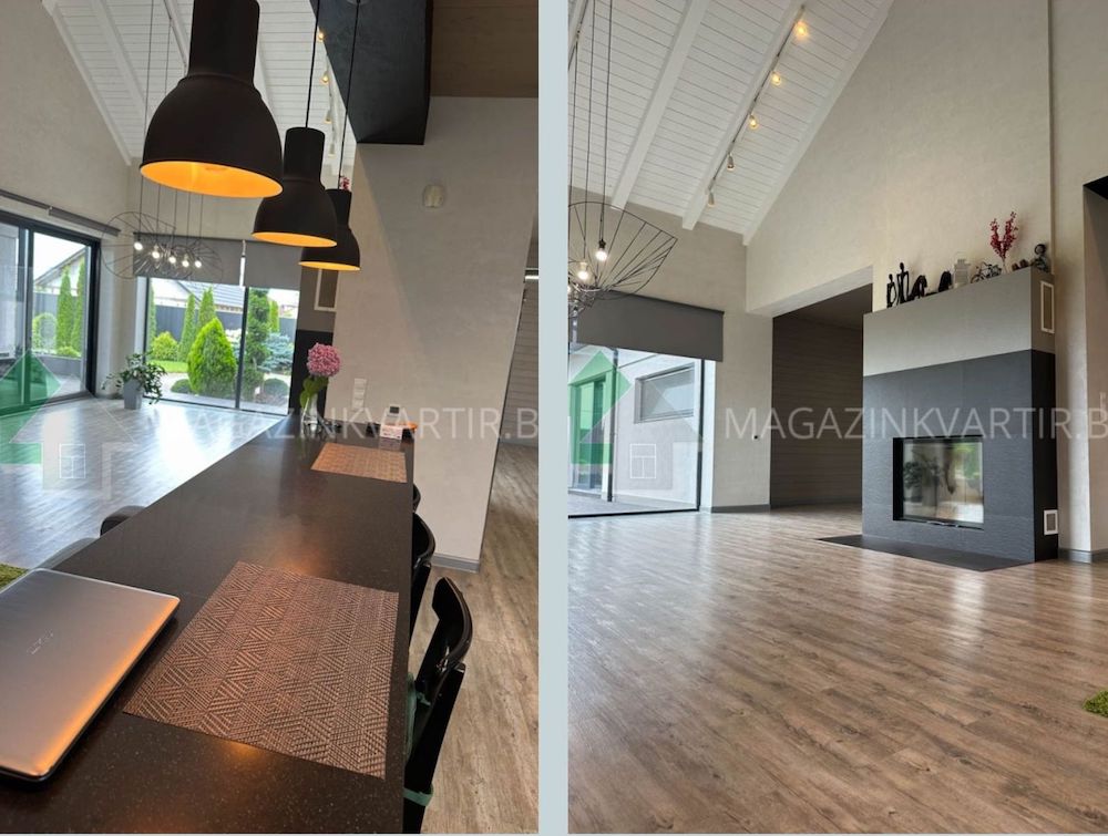 Столовая зона в кухне и камин в гостиной.